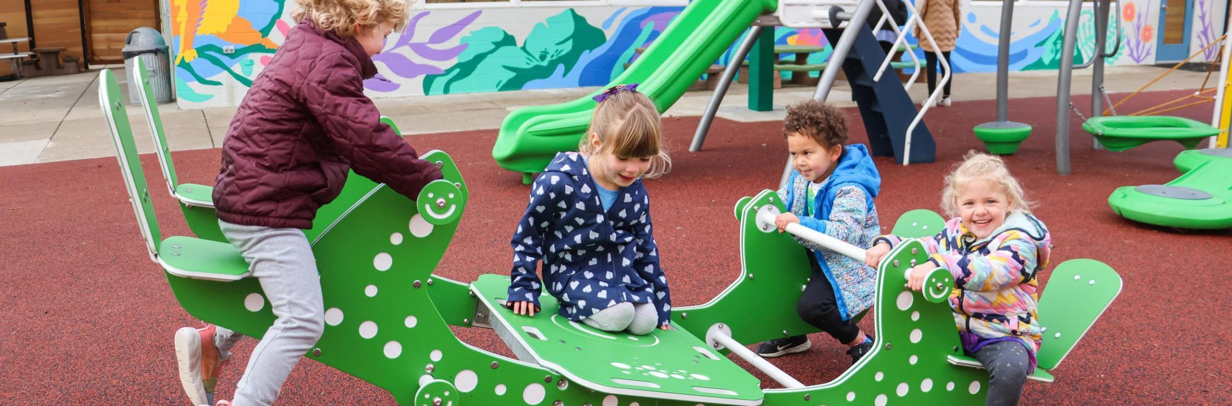 Preschoolers have fun on playground