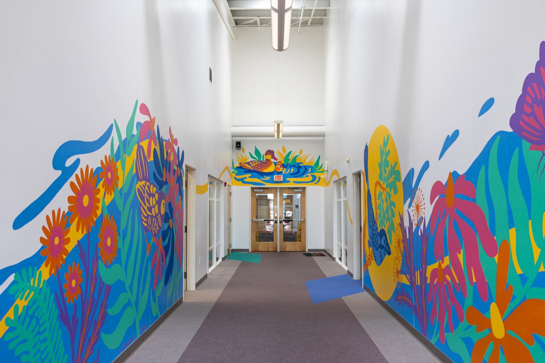 Tiny Ducks Preschool hallway with colorful mural