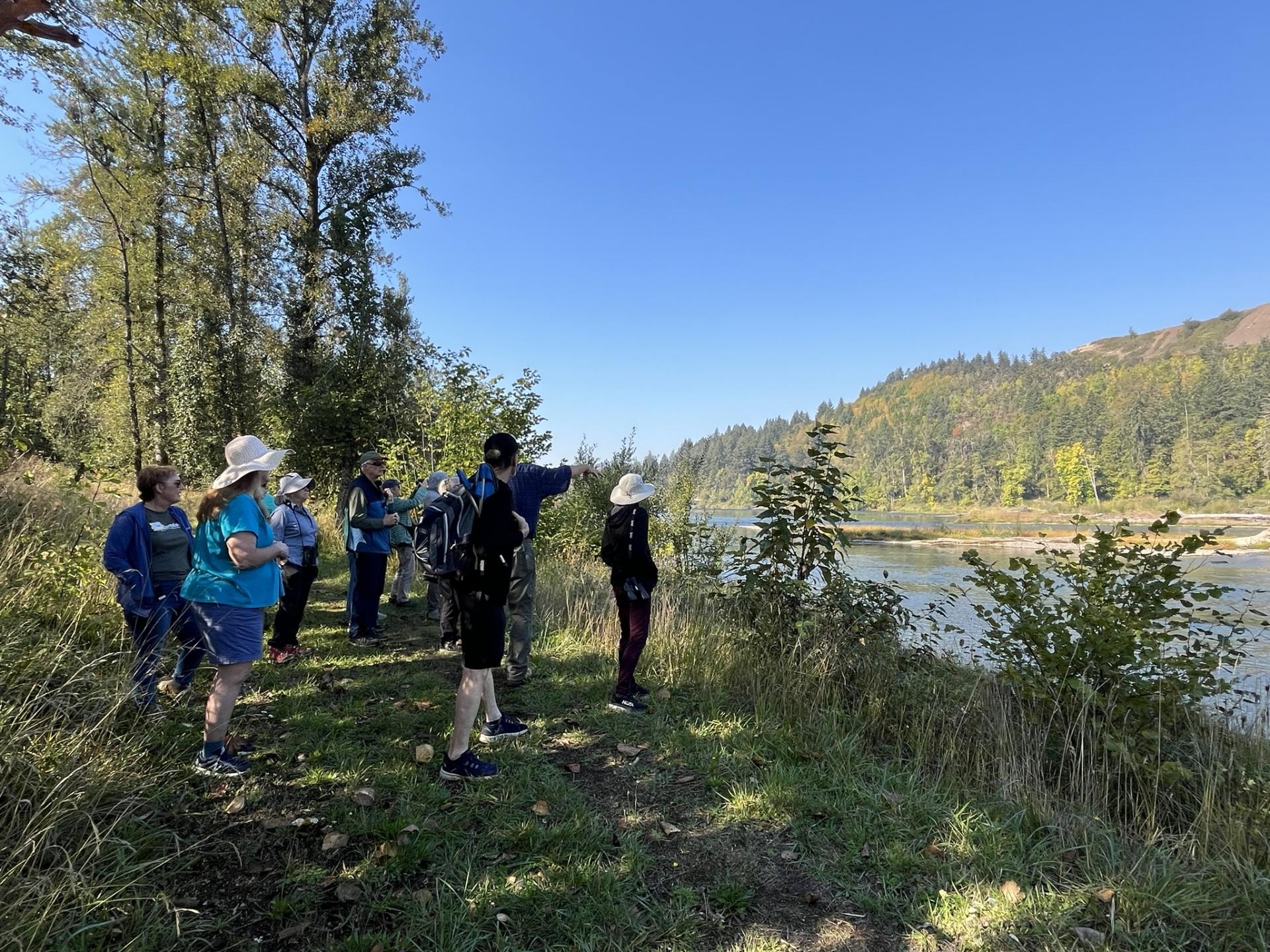 Willamalane hikers stop at a river viewpoint