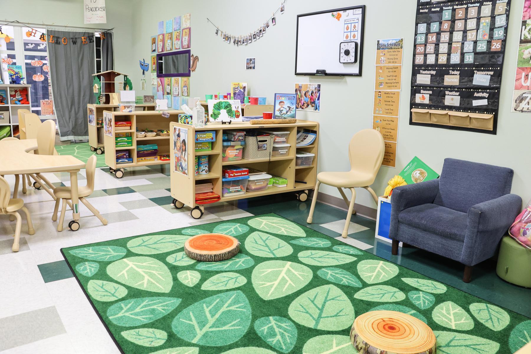 A classroom features new furniture in a bright, welcoming space