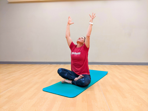 Willamalane yoga Instructor demonstrates to class